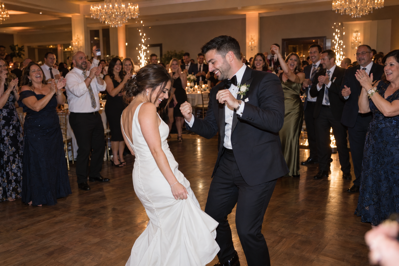 A glamorous wedding dance floor framed by golden cold sparks